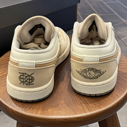 Jordan Air Jordan 1 Low Dongdan Men's Low - top Retro Basketball Shoes. Soft and comfortable, with excellent slip - resistance and wear - resistance. In white and brown colorway, Style Code: IB8855 - 121 Velarano