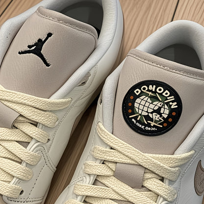 Jordan Air Jordan 1 Low Dongdan Men's Low - top Retro Basketball Shoes. Soft and comfortable, with excellent slip - resistance and wear - resistance. In white and brown colorway, Style Code: IB8855 - 121 Velarano